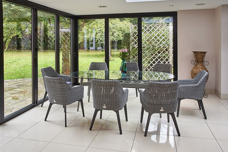 230cm Henley Glass & Aluminium Oval Dining Table with 8 Cliveden Dining Armchairs